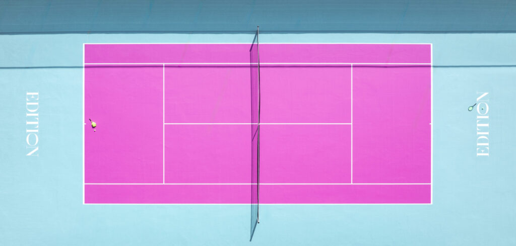 Pink and blue acrylic tennis court with EDITION branding